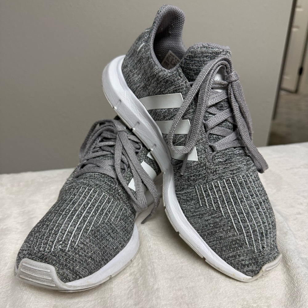 Adidas Swift Run shoes.